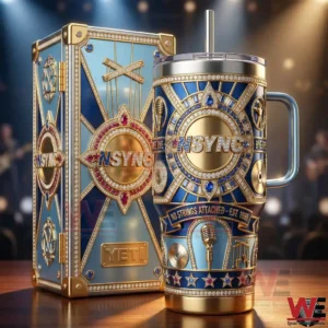 Blue and gold jeweled NSYNC tumbler with handle and straw beside a matching display case on a stage like background!