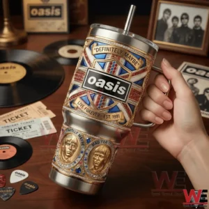 Hand holding an Oasis themed tumbler with records and band photos behind!