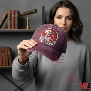 Person holding a purple embroidered skeleton cap!