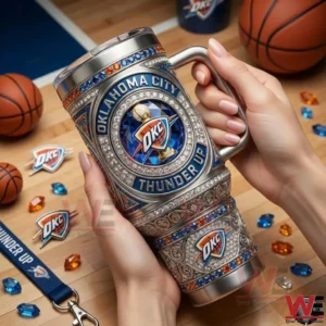 Oklahoma City Thunder Up 40oz Tumbler 5 Hand holding Oklahoma City Thunder tumbler with basketball items on table!