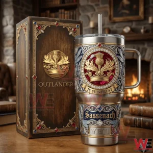 Ornate handled steel tumbler beside a matching gift box on a wooden table!