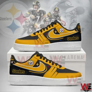 Black and gold Steelers themed sneakers displayed on a shoebox with football players in the background.