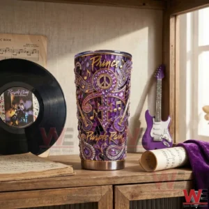 Purple Prince Purple Rain tumbler on wooden shelf with vinyl record and guitar!