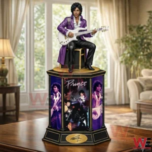 Purple dressed musician figure holding a guitar on a decorative display base!