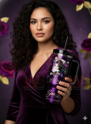 Woman holding a purple Selena memorial tumbler with floral design!