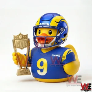 Rubber duck wearing a Rams football helmet and jersey while holding an MVP trophy!