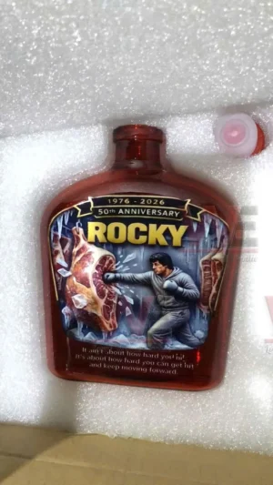 Decorative whiskey bottle with a boxer punching a slab of meat in a dramatic training scene!