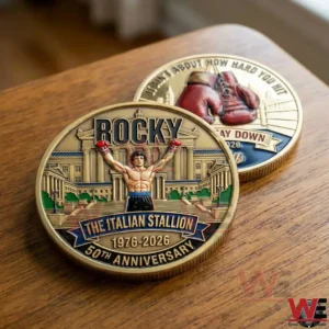 Rocky The Italian Stallion Fifty Anniversary commemorative coin with Rocky raising gloves and boxing gloves design.