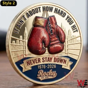 Rocky Fifty Anniversary coin with red boxing gloves and motivational quote design.