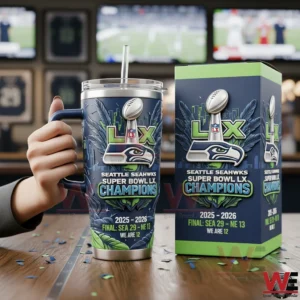 Hand holding a Seattle Seahawks Super Bowl LX Champions tumbler beside the matching box!