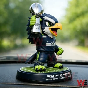 Seattle Seahawks mascot figure holding Super Bowl trophy on car dashboard!