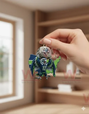Hand holding Seahawks mascot ornament with Super Bowl LX ring indoors!