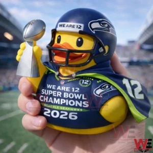 Seahawks champion rubber duck held in hand with trophy!