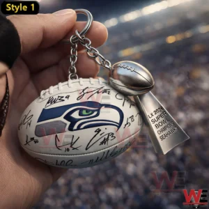 Seattle Seahawks football keychain with signatures and Super Bowl LX 2026 Champions tag.