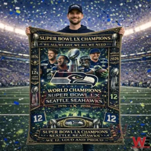 Seattle Seahawks 2026 Super Bowl LX Champions Fleece Blanket 6 Man holding Seattle Seahawks Super Bowl LX Champions fleece blanket inside a football stadium with confetti.