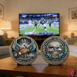 Seahawks championship coin on table with football game on television!