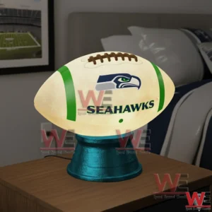 Seattle Seahawks football shaped glowing night light on a table!