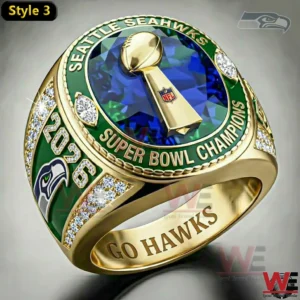Gold Seattle Seahawks Super Bowl Champions ring with Lombardi Trophy and blue gemstone center.