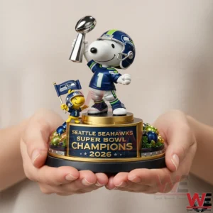 Hands holding Snoopy Seahawks Super Bowl champions resin trophy figurine!