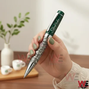 Starbucks 55th-anniversary commemorative ballpoint pen 3 Hand holding a Starbucks anniversary ballpoint pen in a coffee themed setting!