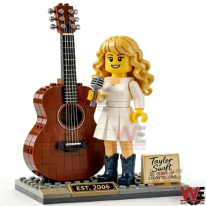 A singer figure with a microphone standing next to an acoustic guitar on a display base!