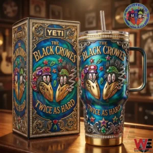 Decorative insulated tumbler with rock themed artwork displayed beside matching box on wooden bar!