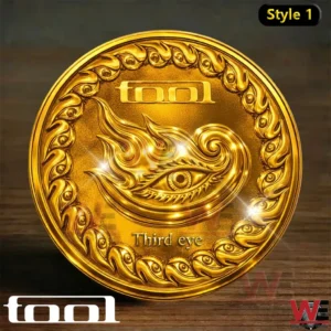 Gold TOOL coin with third eye and flame design!