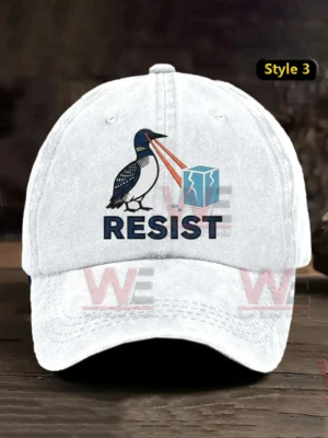 White baseball cap with resist text and bird graphic on the front!