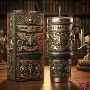 Green and gold Warhammer themed metal tumbler with ornate gothic symbols standing next to a decorative box on a wooden table!