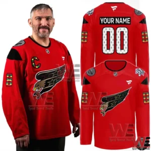 Red hockey jersey worn by a model with eagle logo and cultural patches!