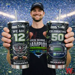 Man holding two Seattle Seahawks We Are 12 celebrating 50 tumblers in a stadium.