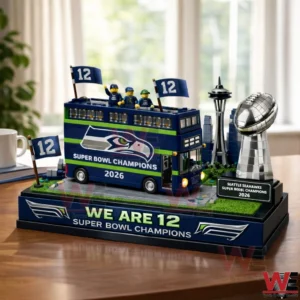 Seahawks We Are Twelve Super Bowl Champions 2026 bus and trophy display on table!