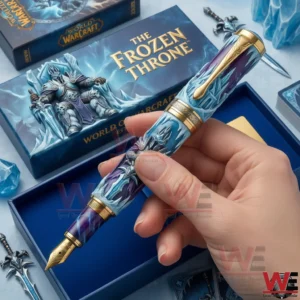 Hand holding a World of Warcraft Frozen Throne collector fountain pen with detailed icy design!