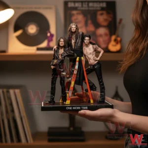 Person holding Yungblud One More Time resin figurine in music themed room.