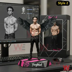 Yungblud resin figurine with black wings on branded display base.