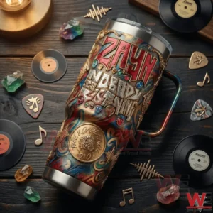Zayn themed insulated tumbler lying on a wooden table with music items!