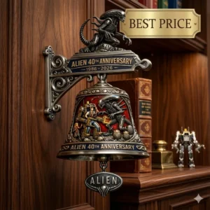 Alien Anniversary Wall Bell with creature sculpture and battle scene on a wooden wall!