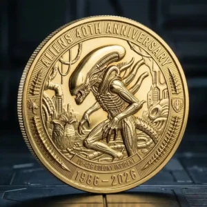 Gold alien anniversary collector coin in close view!