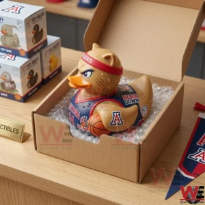A collectible Arizona Wildcats rubber duck toy packaged inside a cardboard box with bubble wrap and a miniature basketball.