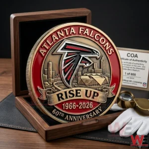 ATLANTA FALCONS 60TH ANNIVERSARY COIN 5 Atlanta Falcons 60th anniversary coin in a wooden display box with certificate of authenticity gloves and a magnifier.