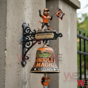 Baltimore Orioles anniversary wall bell on a decorative bracket mounted to a concrete pillar outdoors!