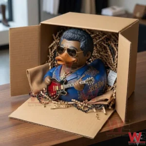 BB King Guitar The Thrill Is Gone Rubber Duck 3 An open cardboard box containing the B.B. King duck figure on shredded paper! Accessories like a cloth, silica packet, and picks are around it!