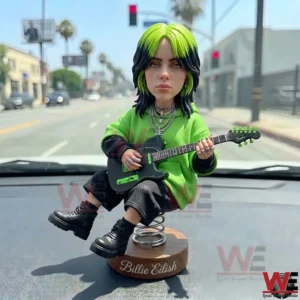 Billie Eilish inspired dashboard doll with guitar on a car dashboard!