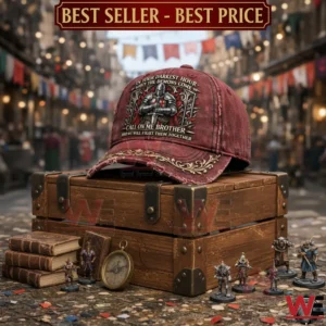 Vintage burgundy cap with medieval knight patch and inspirational text on a wooden chest!