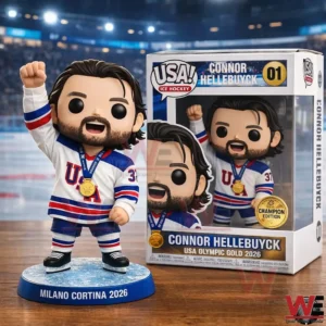 Collectible ice hockey figure with gold medal beside its box on an arena background.