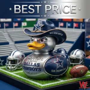 A silver Dallas Cowboys themed rubber duck wearing a team cowboy hat sits on a tiny green football field. It is surrounded by miniature helmets and a football with a stadium background.