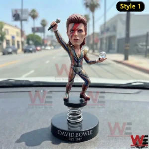 David Bowie bobblehead standing on a car dashboard!