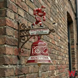 Detroit Red Wings anniversary wall bell with a hockey player figure mounted on a brick wall!