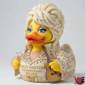 Yellow collectible duck in jeweled white outfit holding a guitar!
