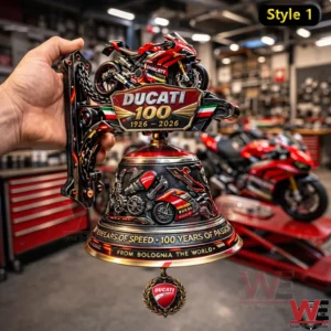 Ducati one hundred year anniversary wall bell with red sport bike model on top in a workshop setting.